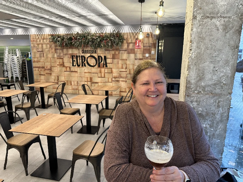 Wall of European brewery logos at Cervecería Europa Internacional Seville