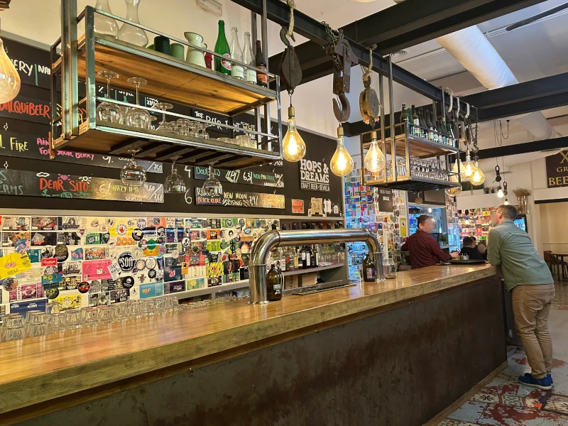 Bar taps and beer selection at Cervecería Hops and Dreams Seville