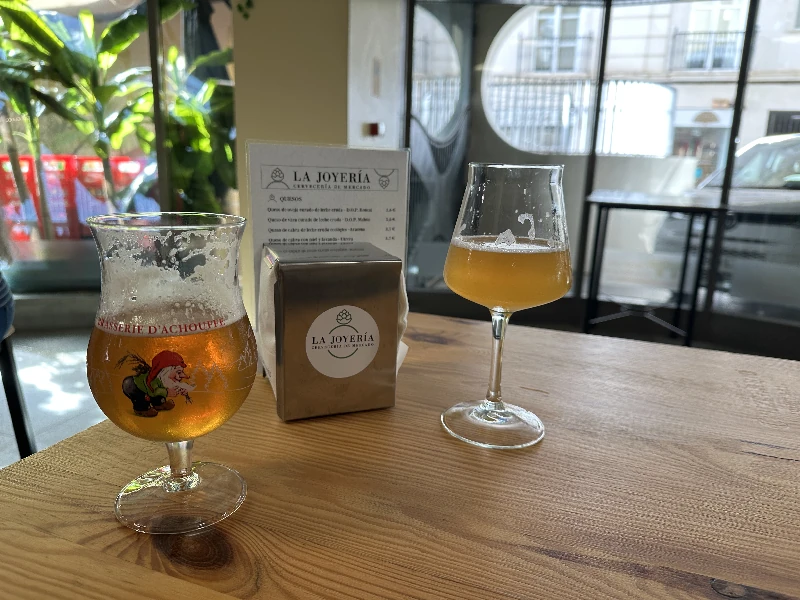 Table and seating area at La Joyeria cervecería, Seville